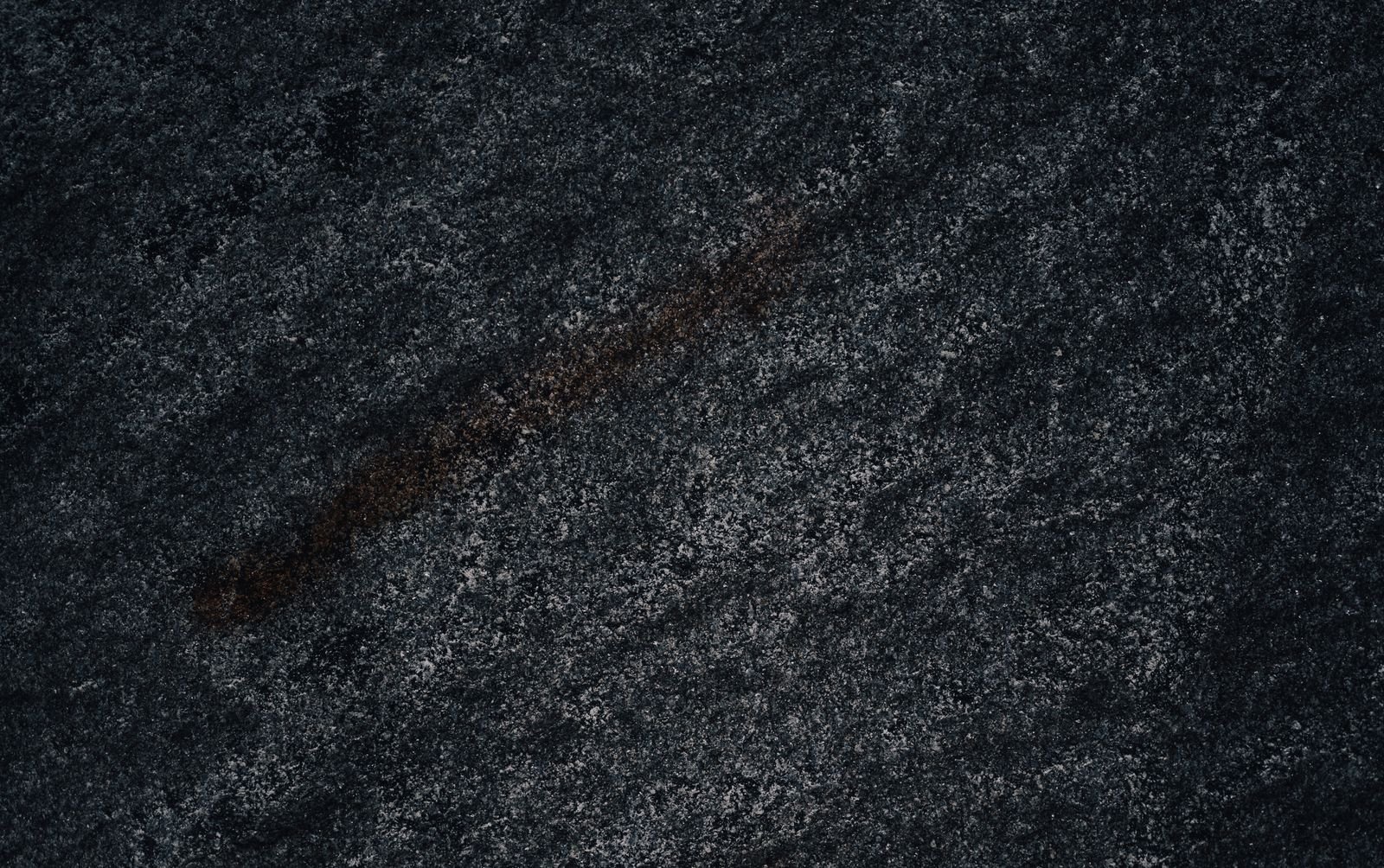 Black Galaxy granite slab, speckled dark stone