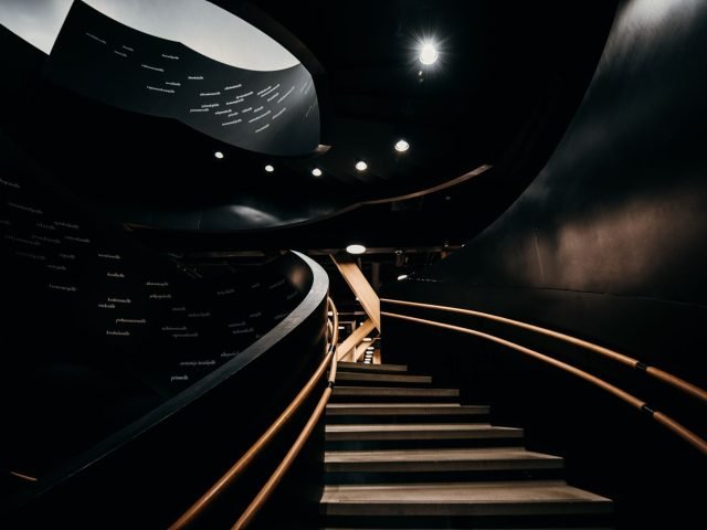 Black granite staircase in a modern interior