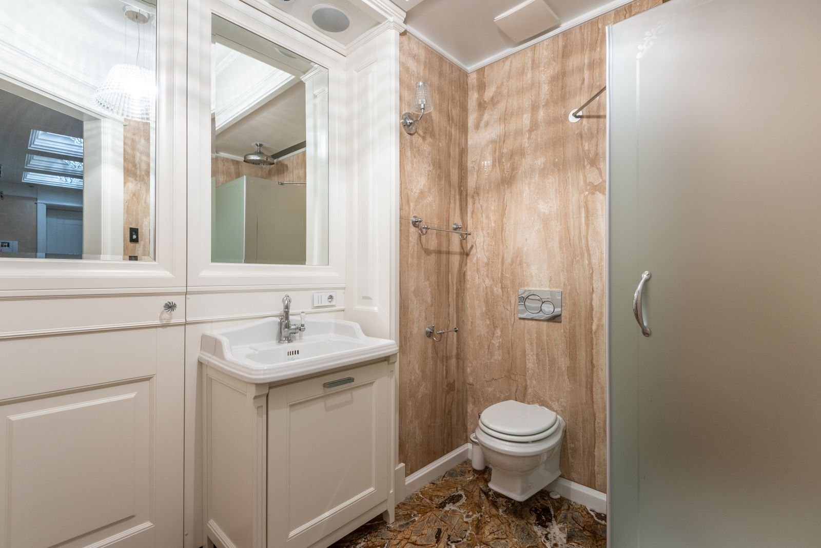 Renovated bathroom with marble accents