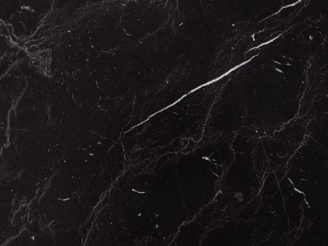 Nero Marquina black marble slab with white veining