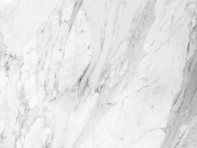 Statuario white marble slab with bold veining